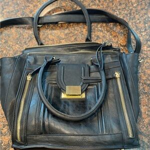 Imoshion purse used once, two handles